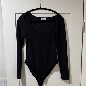 Black ribbed long sleeve bodysuit